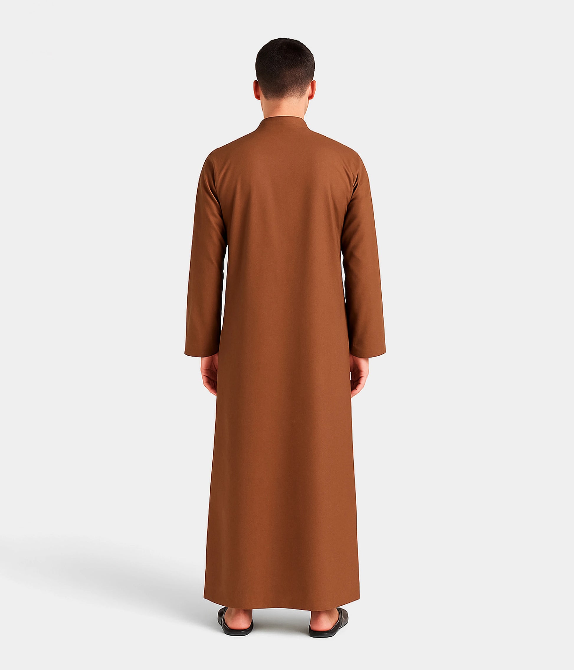 Back profile of traditional thobe in brown