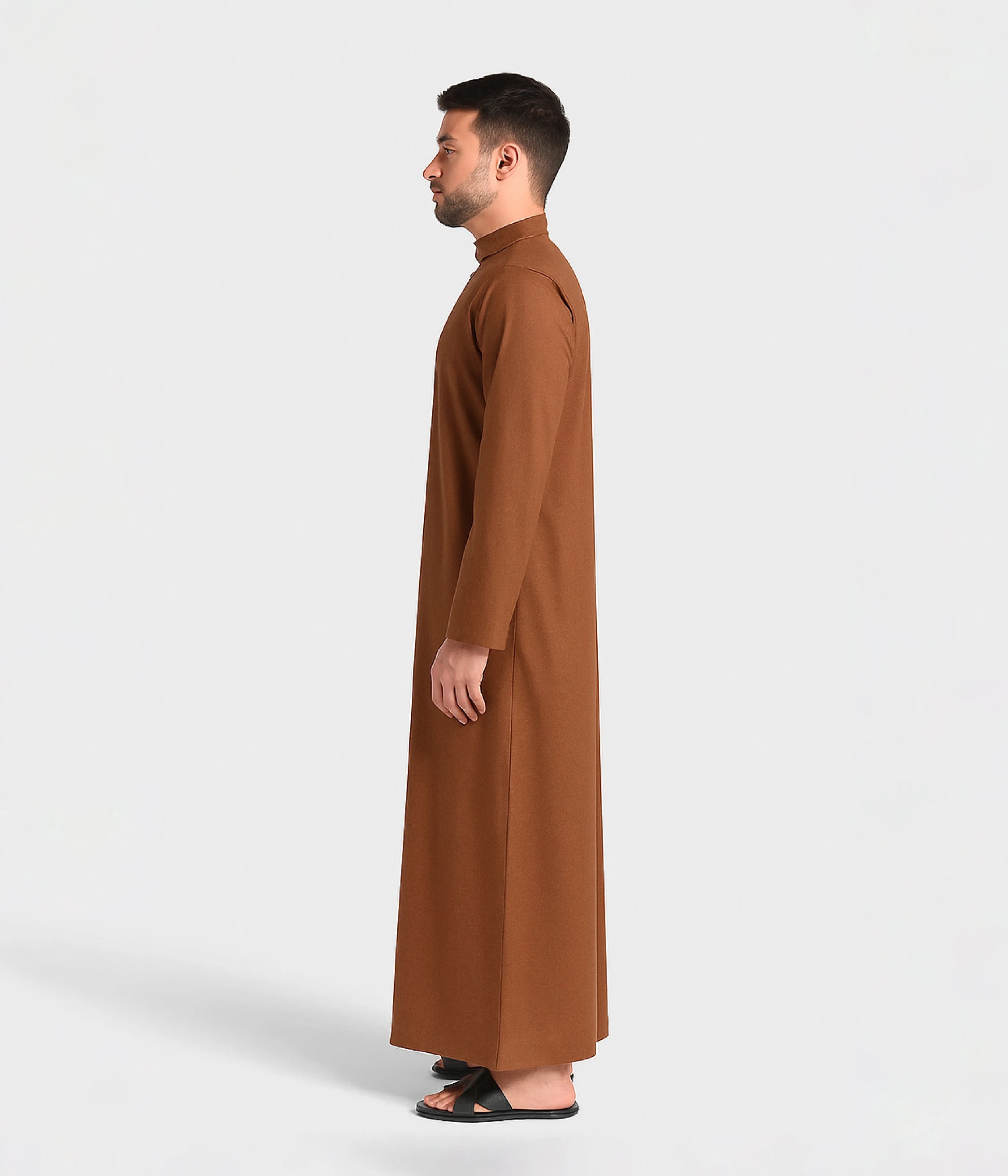 Side view of brown kandura in Kuwaiti style