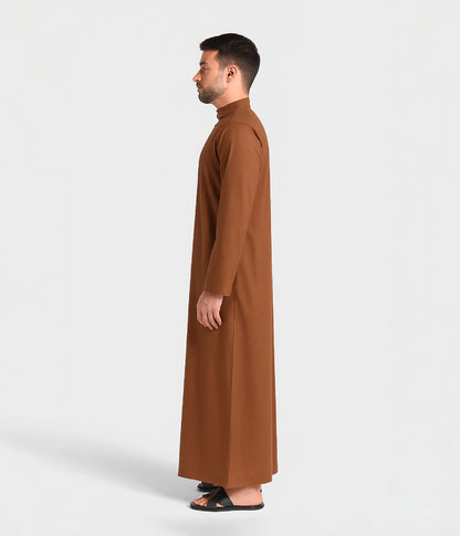 Side view of brown kandura in Kuwaiti style